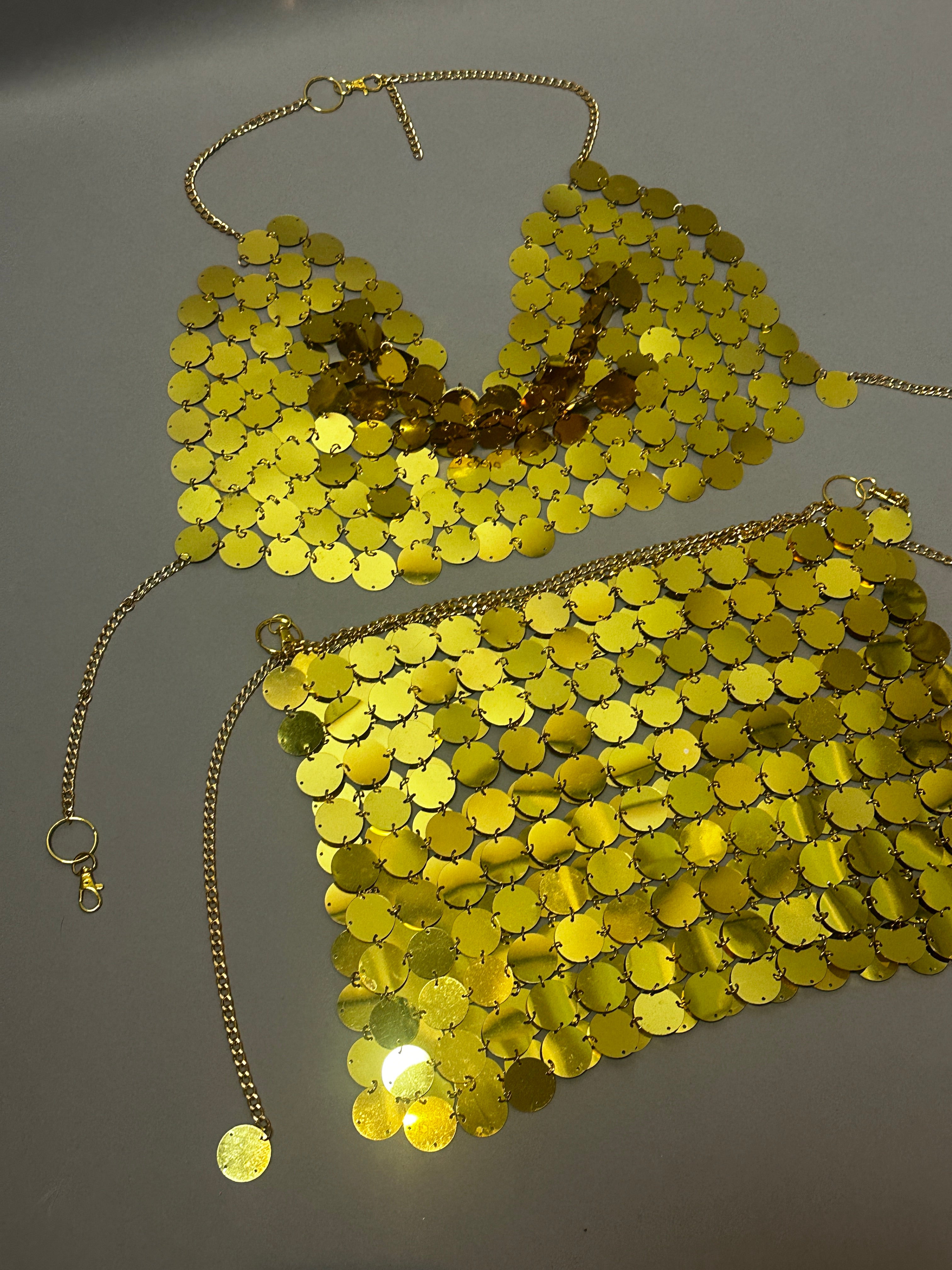 The Gold Chain Two-Piece Set for Performers features a supportive, sequin-adorned crop top and a stylish gold chain, perfect for any performance.