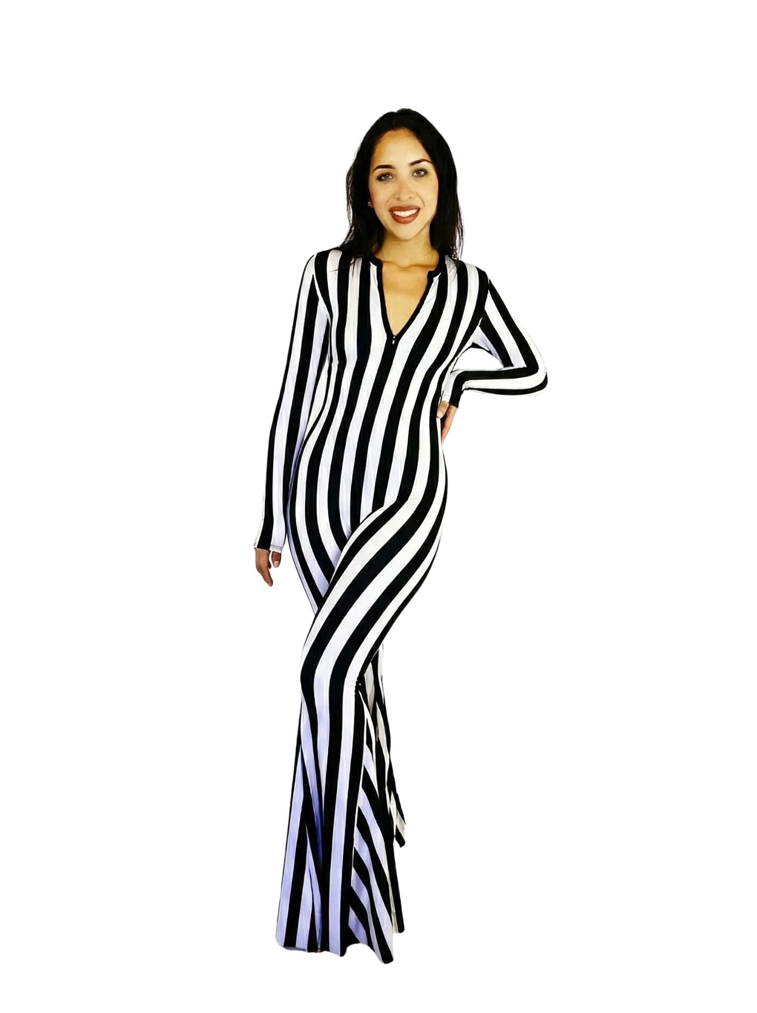 Woman wearing the Beetlejuice Black and White Striped Catsuit with bellbottom legs and a front zip, smiling and posing against a white background.