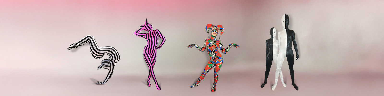 Four people in colorful, patterned bodysuits pose against a soft pink and white background.