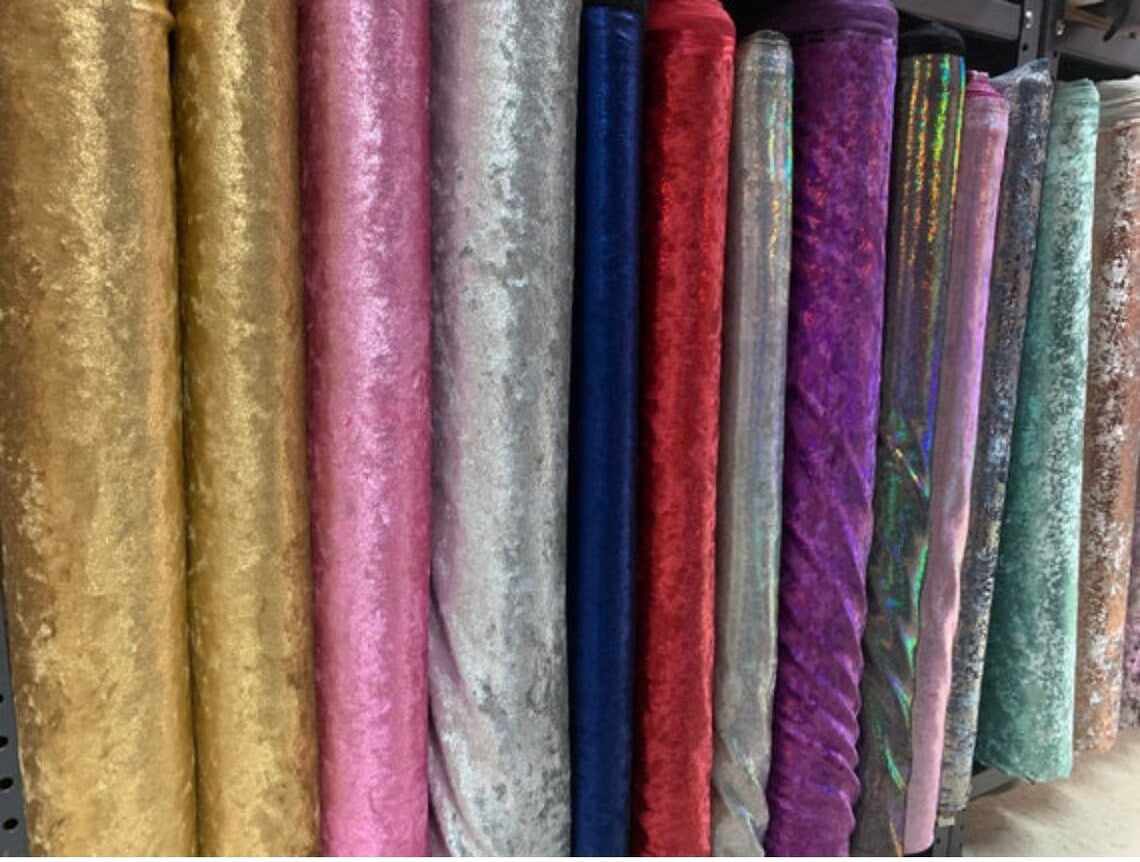 Velvet Open Back Jumpsuit: Exotic dance wear in vibrant crushed velvet shades, trending now for crafting bold festival outfits or striking bodysuit costumes.