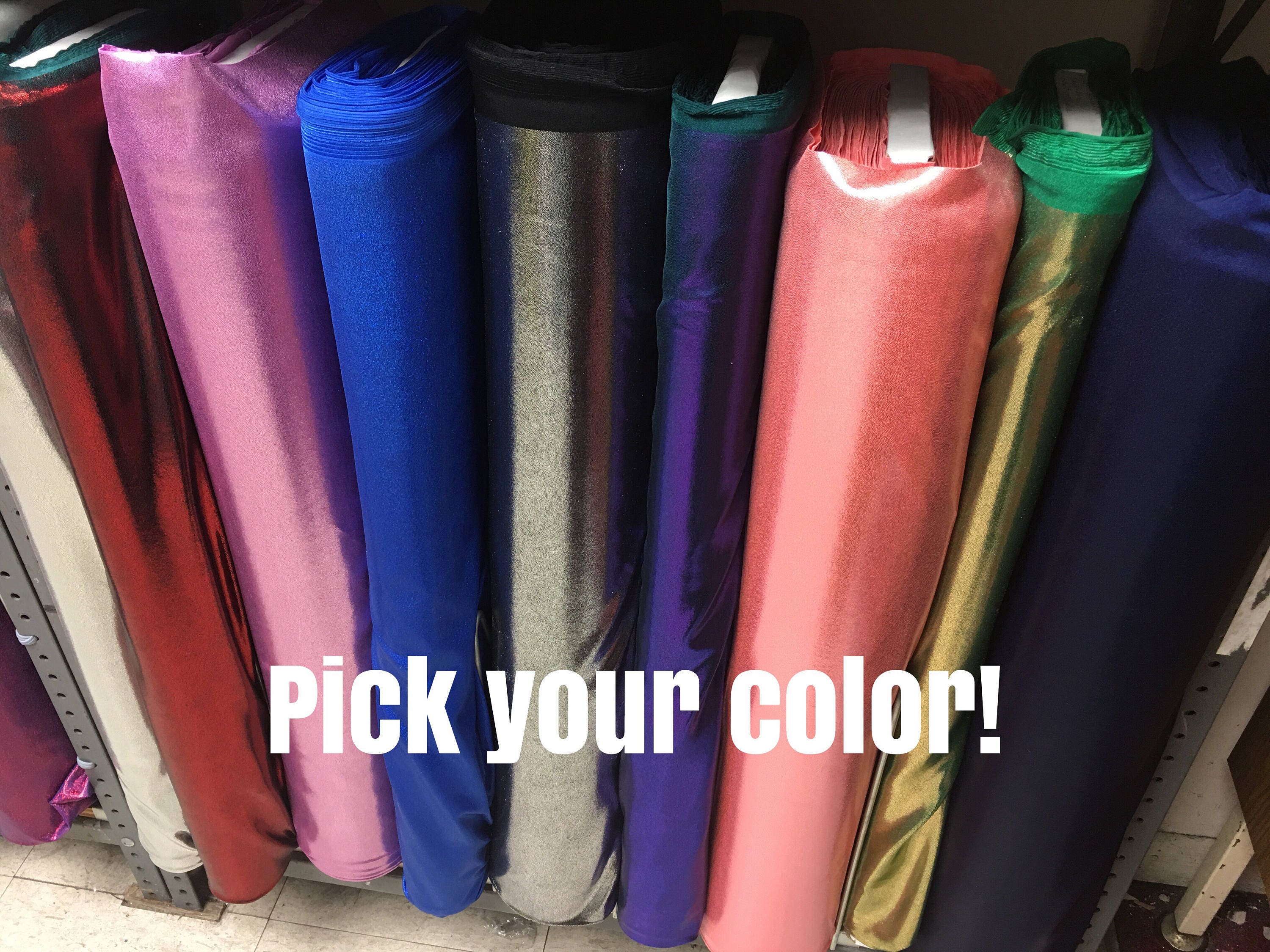 Vertical rows of vibrant fabric, featuring shimmering holographic Lycra, with text overlay: "Choose Your Color!" Ideal for futuristic clothing and exotic dancewear like the Robot Costume Spandex Bodysuit. Trending now!.