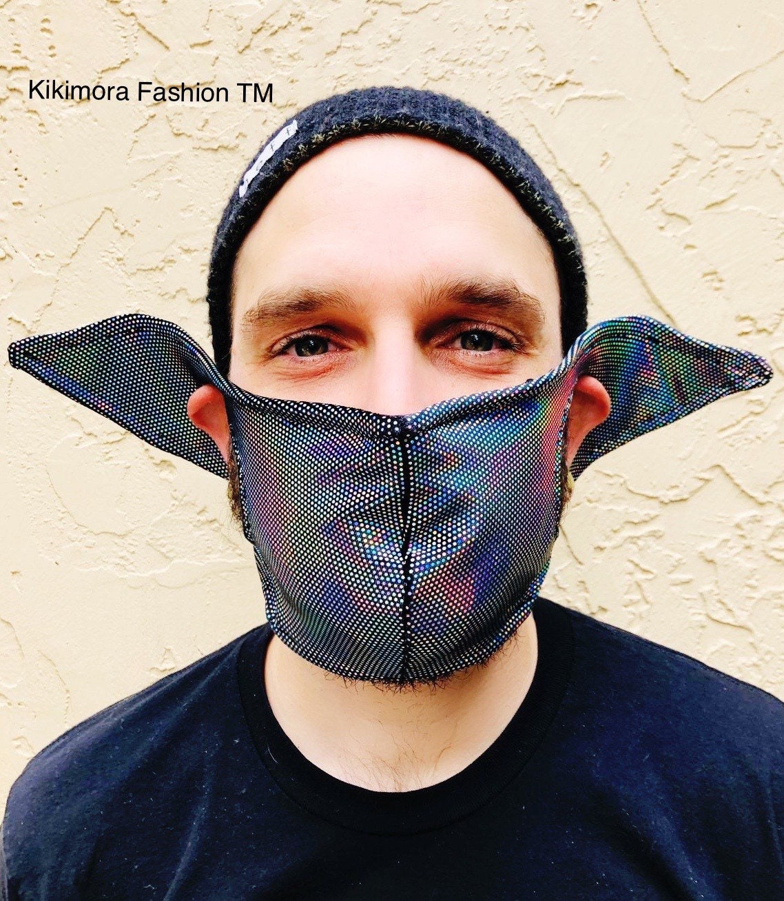 Someone in a beanie wears the Elf Ears Face Mask for All Ages—a funny, fantasy-inspired mask made in the USA—bringing Kikimora Fashion together with a playful, sustainable flair.