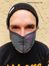 A person in a knit beanie and an Elf Ears Face Mask for All Ages from Kikimora Fashion looks directly at the camera.