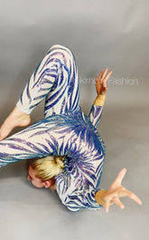 A contortionist captivates with a backbend against a gray background, wearing a Black and Red Floral Sequins Catsuit featuring a teardrop back opening and full sleeves.