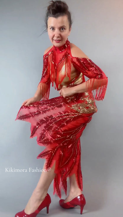 Woman models the bearded French accessories Sequin Sheer Dress, featuring a backless design and beaded fringe accessories, against a plain background.
