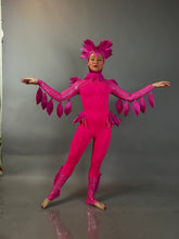 Showcasing the Pink bird full costume for aerial and dancers—featuring vibrant feathers, perfect for stage performances and dance acts, shown here in a dynamic pose against a gray background.