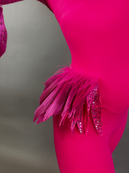 Model wearing the Pink Bird Full Costume for aerial and dancers, featuring pleated and sequined feather-like hip details, shown against a plain background.