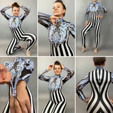 Model showcases the Glamorous Sequins Stripes Catsuit costume, featuring black-and-white stripes, blue ornate accents, and a sequined leaf design, displayed from multiple angles.