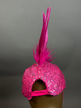The Pink Bird Headpiece features sparkling sequins and a tall pink feather plume, making it a stunning choice for fairy hats, aerialist shows, theatrical costumes, festival outfits, or rave accessories.