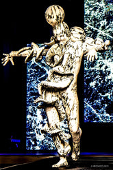 Two performers take the stage in artistic Mushroom Creature Costumes, wearing avant-garde full body suits crafted from marble print spandex that glow under UV light.
