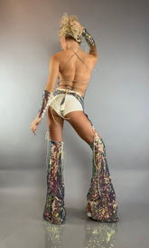 Turn heads in this dazzling festival costume set featuring sparkly sequin chaps pants, a laced strappy top, coordinating white bottoms, matching arm warmers, and high-heeled boots—the perfect sequins performance outfit for standout moments.