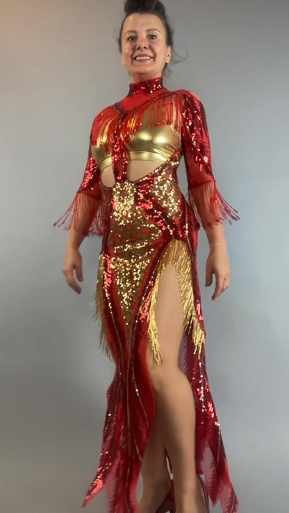 Woman wearing the bearded French accessories Sequin Sheer Dress—backless, with beaded fringe accessories—smiling and posing against a plain gray background.