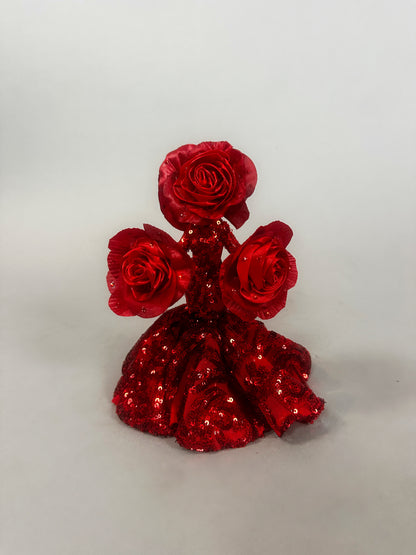 A magical art object by Kikimora Studio: the Mini Living Rose sculpture doll ornament, featuring three handcrafted red rose figures atop a sequined red dress.