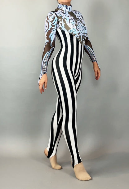 Person wearing the Glamorous sequins Stripes Catsuit, a black-and-white vertical striped costume with sheer ornate blue and white detailing on top and a subtle sequined leaf design.