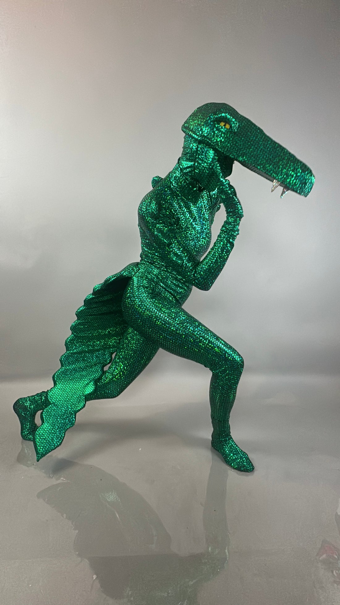 Wearing the Alligator costume, Crocodile outfit for Halloween or Stage Show, this person poses dramatically against a light gray background, topped with a bold feather headpiece—perfect for TV filming and theatrical performances.