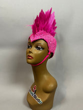 Mannequin head displays the Pink Bird Headpiece—feathered helmet with chin strap—Fairy Hat Accessory, Aerialist Headwear, perfect for theatrical costumes, festivals, or rave outfits. Plain background enhances this bold prop.