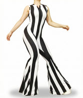 Someone models the Black and White Stripes Bell Bottom Catsuit with a front zipper and sleeveless design, featuring flared legs, while posing against a white background.