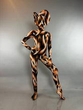 A person wears a Brown Snake Print Turtleneck Catsuit with Back Zipper and a matching headpiece.