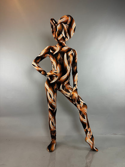 A person wears a Brown Snake Print Turtleneck Catsuit with Back Zipper and a matching headpiece.