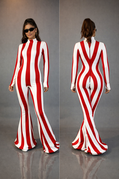 Woman in the Rave White Striped Catsuit with bellbottom legs, featuring bold white stripes, shown from front and back with sunglasses—a standout performance jumpsuit.