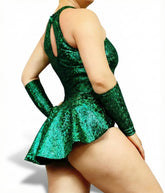 Model wears the Emerald Green Leotard with Half Skirt, Halterneck, and Sleeveless design, complete with matching hand accessories—an eye-catching dance costume set against a white background.