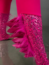 Close-up of the Pink bird full costume for aerial and dancers—pink sequin pants with feathered trim and matching leggings, reflected on a shiny surface—an eye-catching choice for stage performances.