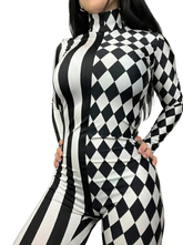 Woman modeling the Black and White Split Fabric Catsuit, featuring stripes and diamond patterns, full sleeves, and a turtleneck; shown from shoulders to thighs with hands on hips.