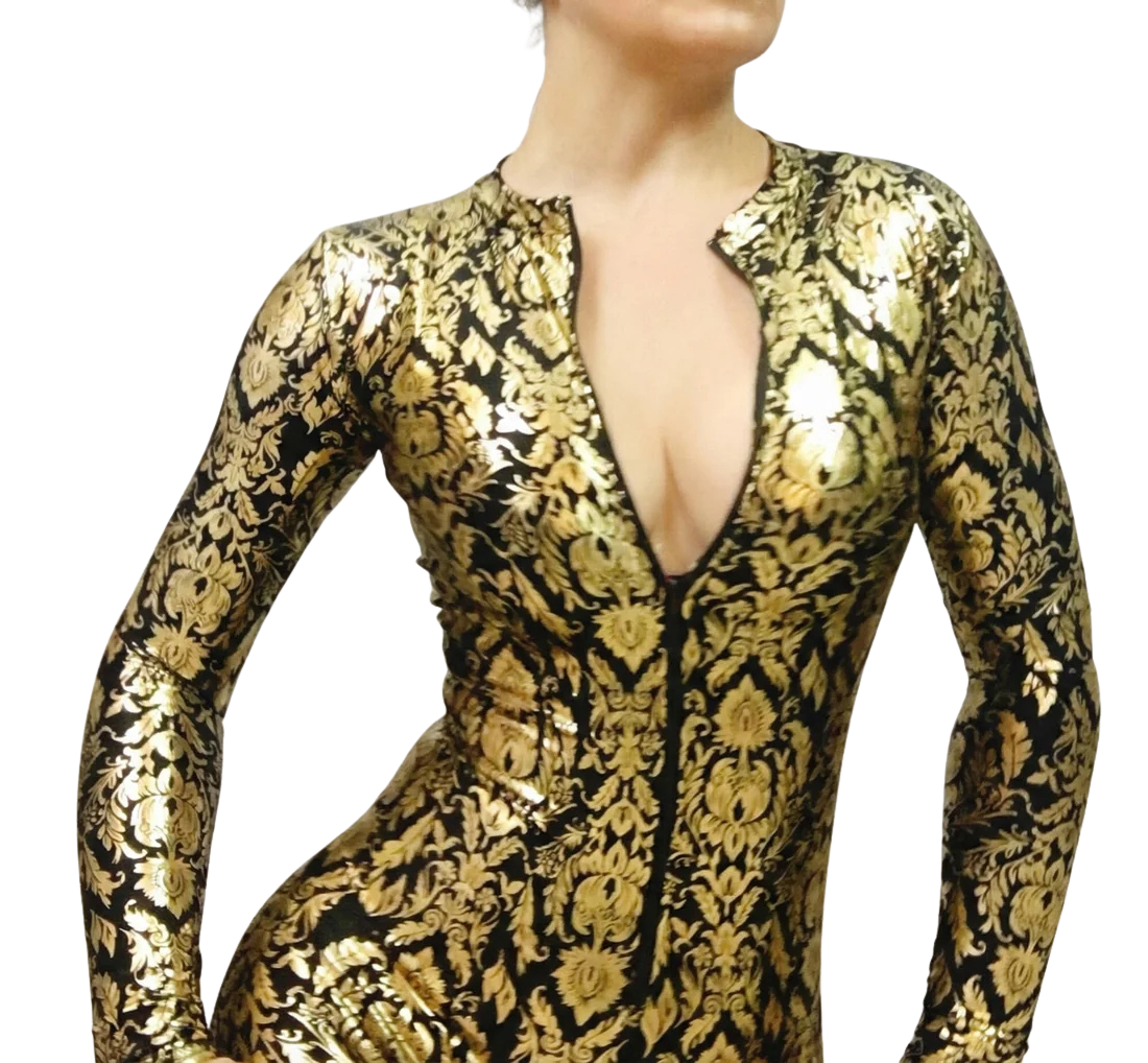 Confident individual poses in the "Catwoman Bodysuit Costume," a beautiful gold and black patterned Spandex catsuit with deep V neckline and 4-way stretch—perfect as exotic dancewear or a party outfit.
