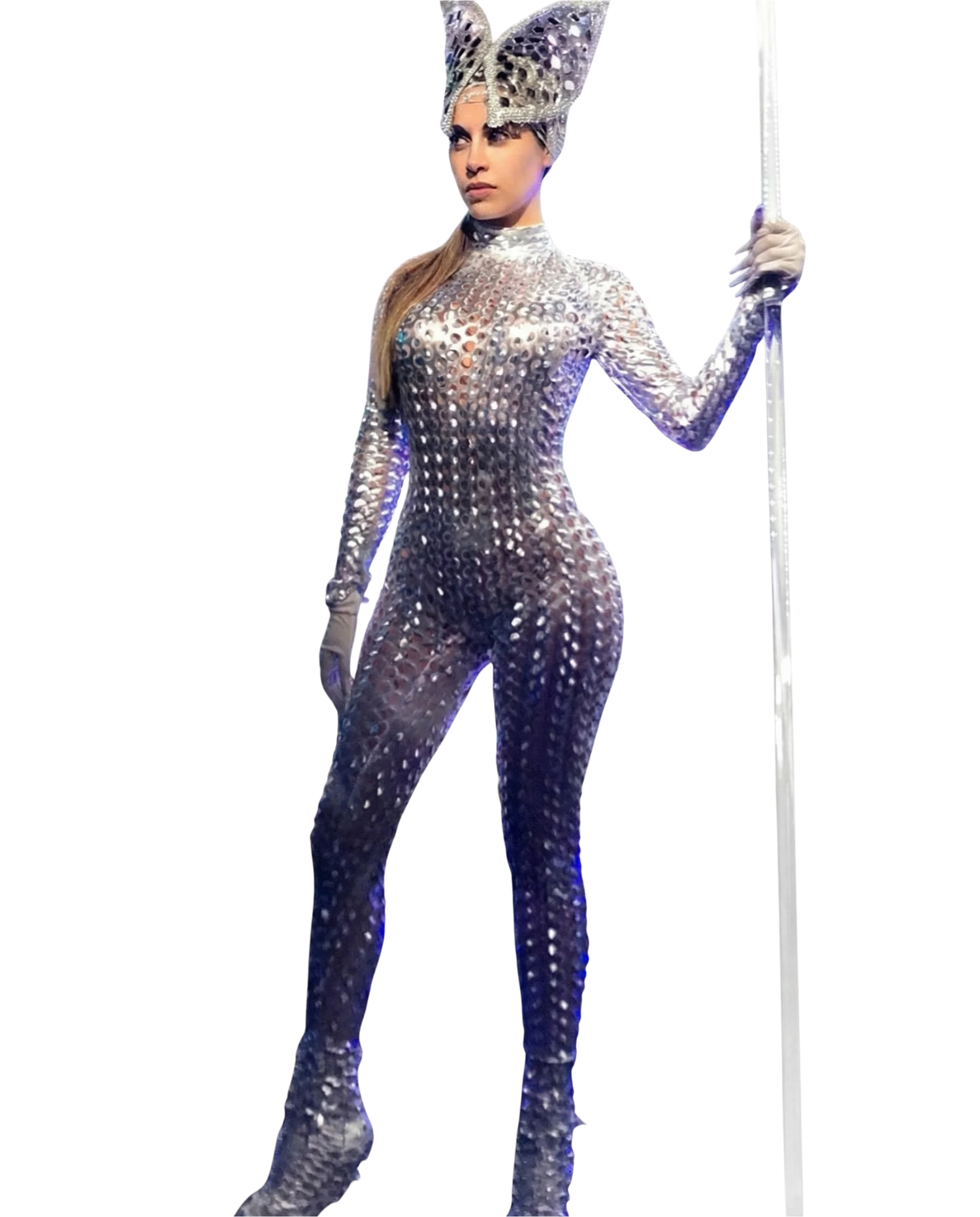 A performer wears the Silver Leotard Catsuit for Dance and Performance, featuring a futuristic scaled texture, and accessorizes with a headpiece while holding a tall staff confidently.